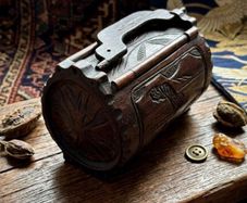 vintage hand-carved wooden cylindrical barrel box