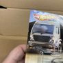 Nissan Skyline R34 Nismo Team Transporter Hot Wheels Creased Card Image 3