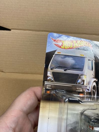 Nissan Skyline R34 Nismo Team Transporter Hot Wheels Creased Card