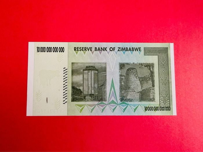 Zimbabwe 10 Trillion Dollars. UNC  2008..verified Under Uv Light. )