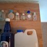 Empty holy water bottles and other religious items Image 5