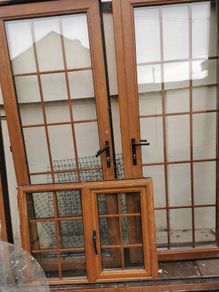 Solid 15 panel Oak doors, frame and window for sale