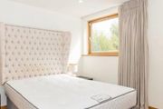 Designer headboard with linen upholstery