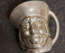 Miniature.Toby metal jug ,see pictures for condition, sold as is, nice display item,,buyer collects or pays postage thank you,
