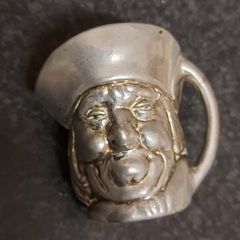 Miniature.Toby metal jug ,see pictures for condition, sold as is, nice display item,,buyer collects or pays postage thank you,