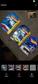 Hot Wheels Ferrari die-cast model cars from the mid-2000s and late 1990s card collections.