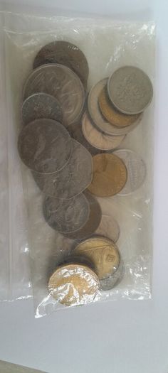 Coins a mix of different countries 28 coins in total registered post included