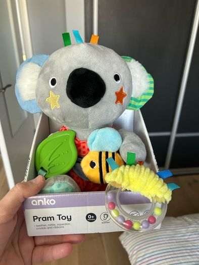 Pram toy with rattle