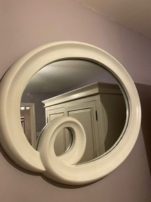 White framed mirror. W94cm H 74cm.