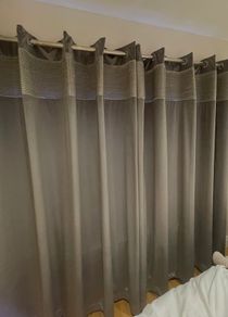 Grey velvet eyelet curtains