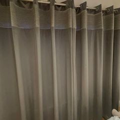 Grey velvet eyelet curtains