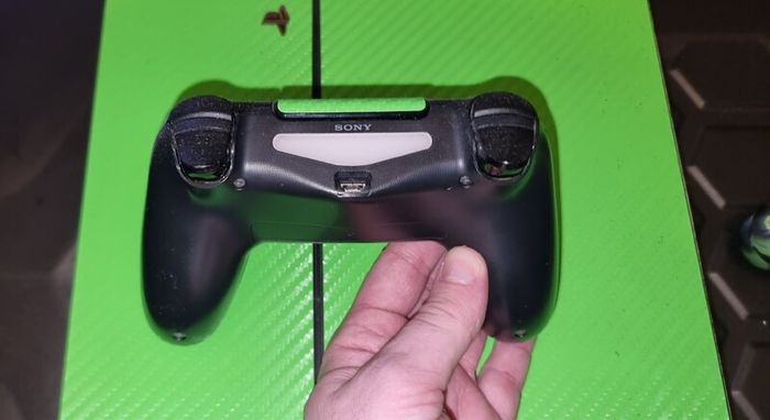 Playstation 4 with two controllers