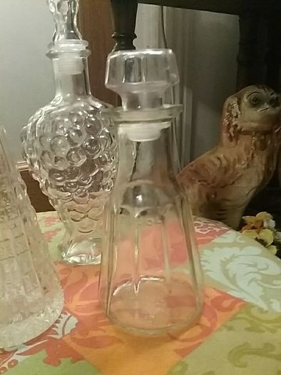 Four Glass Decanters with Stoppers