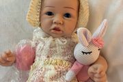 doll.       Very cute full bodied silicone reborn doll