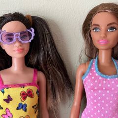 2 Barbie Dolls