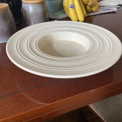 A vintage cream-coloured dish Sombrero" design by Keith Murray for Wedgwood