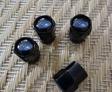 Brand New Subaru Black Metal Dust Caps x4