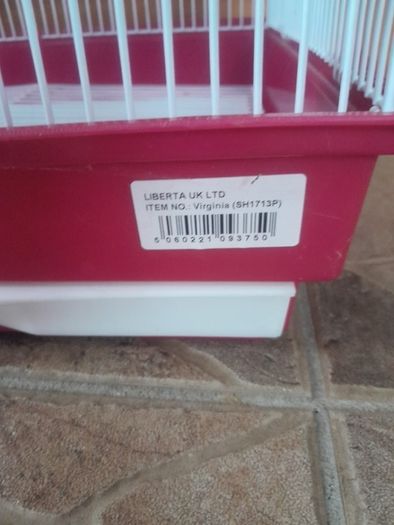 pink bird cage