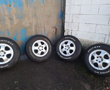 Tires with aluminum rims 265/70/17. A/T