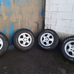 Tires with aluminum rims 265/70/17. A/T
