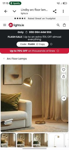 Gold arc free standing lamp