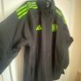 Black and neo green Adidas Celtic all weather jacket Image 2