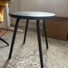 Small grey metal table