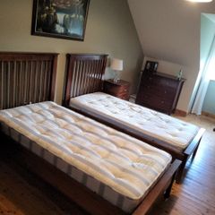 2 single beds with mattresses
