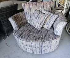 Swivel Loveseat - Frank McGowan