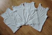 White vests  Age 11-12