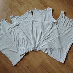 White vests  Age 11-12