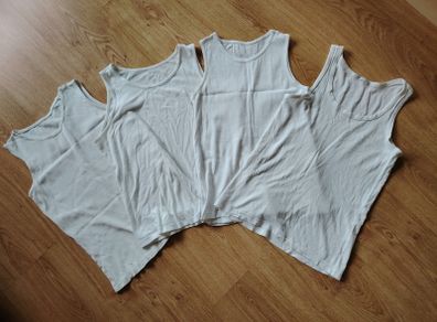 White vests  Age 11-12