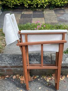 chair folding Folding Wooden Director's Chair featuring a stained hardwood