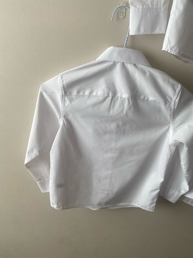 3 dunnes white shirts (new/as new) age 6-7