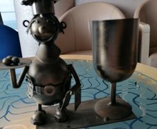 Metal chef ornament with wine glass holder