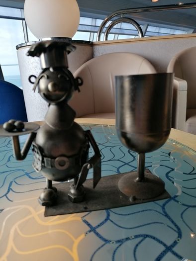 Metal chef ornament with wine glass holder