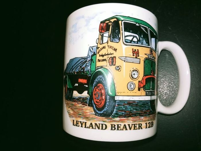 collection of six automotive mugs