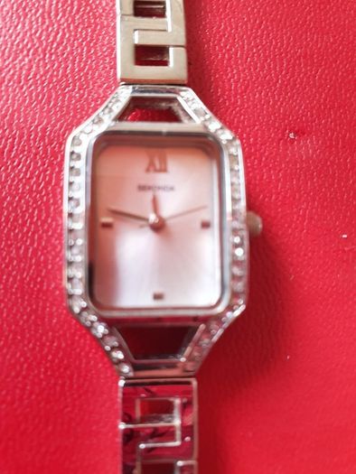 silver watch and matching bracelet