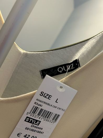 Never worn dress with tag. Large size .