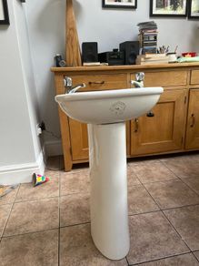 Sink, pedestal with hot and cold taps