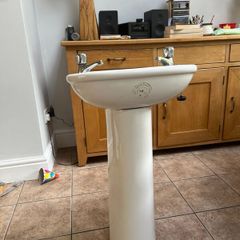 Sink, pedestal with hot and cold taps