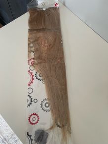 Hair extensions in Medium Blonde. Rea hair.