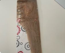 Hair extensions in Medium Blonde. Rea hair.
