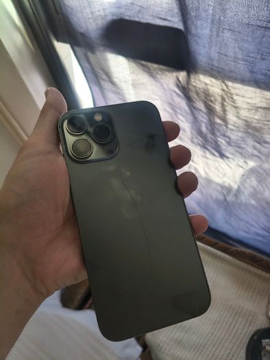 Apple iPhone for sale with a damaged screen