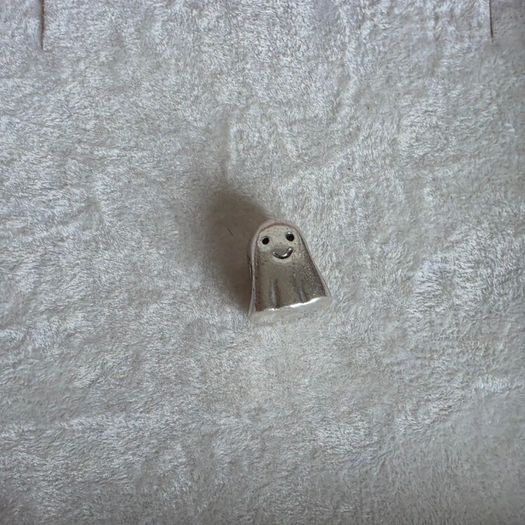 Pandora ghost charm in good condition the stamp is well used otherwise nothing wrong