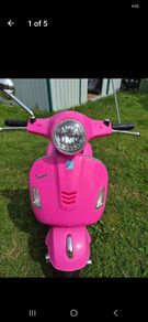girls vespa motorbike