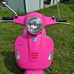 girls vespa motorbike