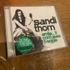 SANDI THOM Smile... It Confuses People
