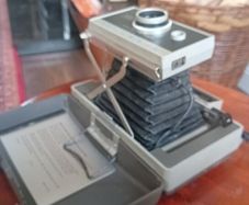 Polaroid 330 camera with instructions