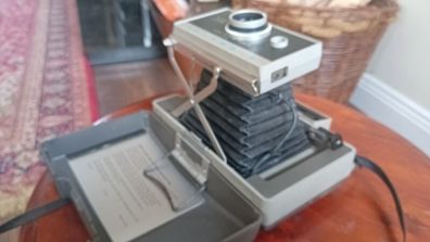 Polaroid 330 camera with instructions